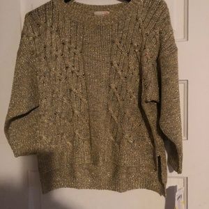 Knit sweater.